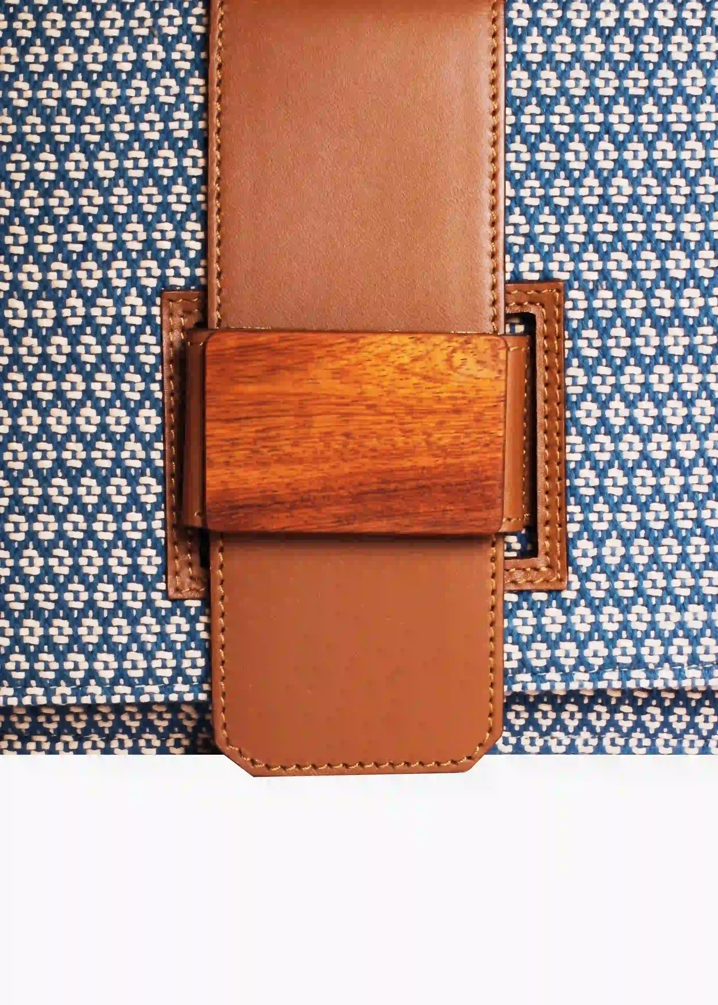Berlin Align Topaz crossbody bag — close-up of brown leather trim and handwoven cotton weave