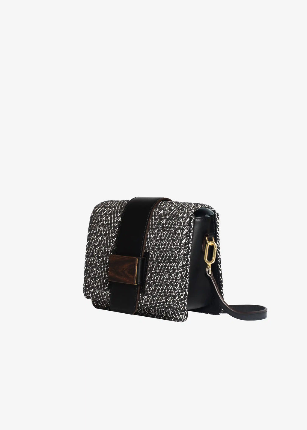 Berlin crossbody bag side profile — structured leather body with adjustable strap