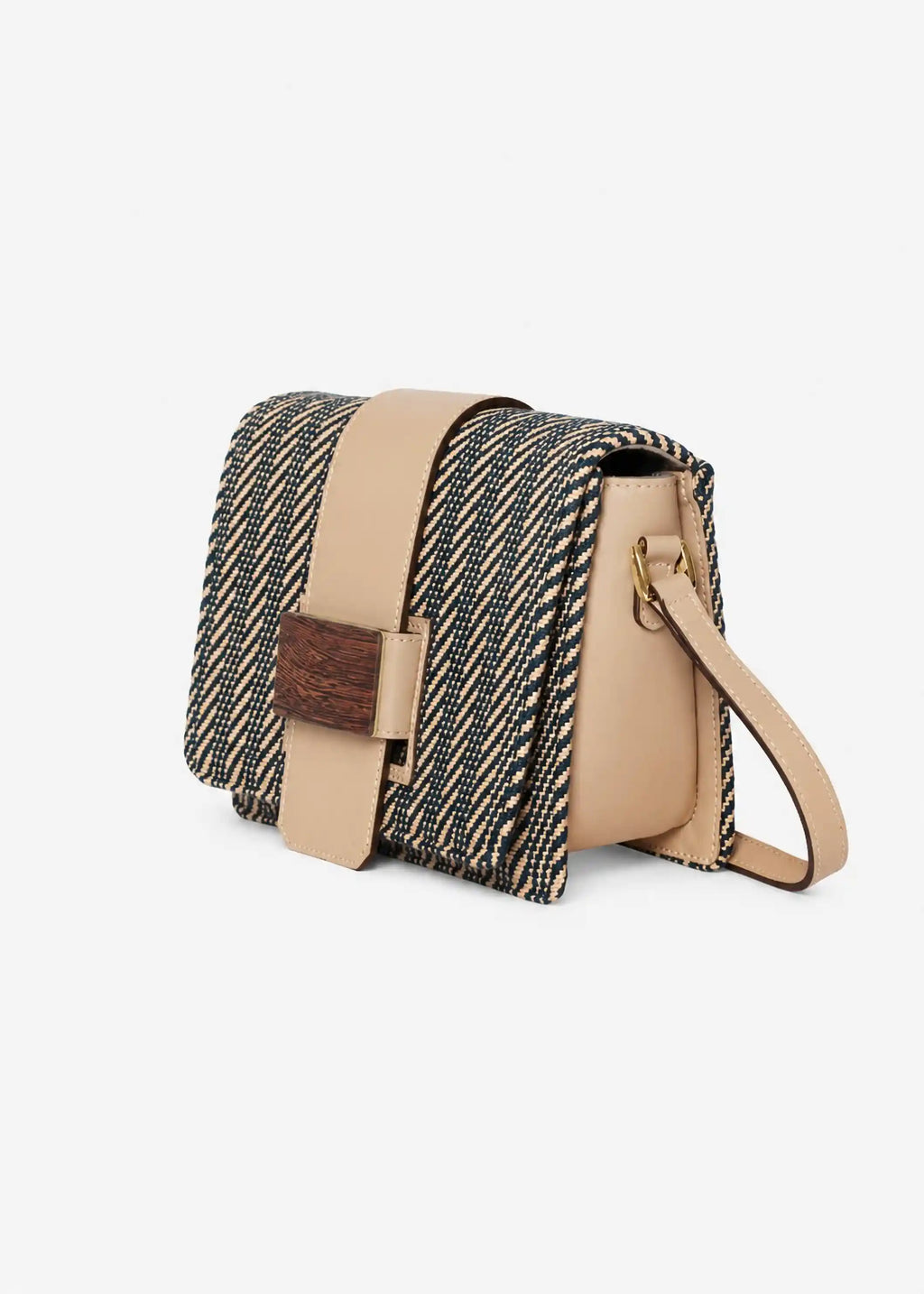 Berlin Twist Dusk crossbody bag side profile — beige leather body with adjustable strap