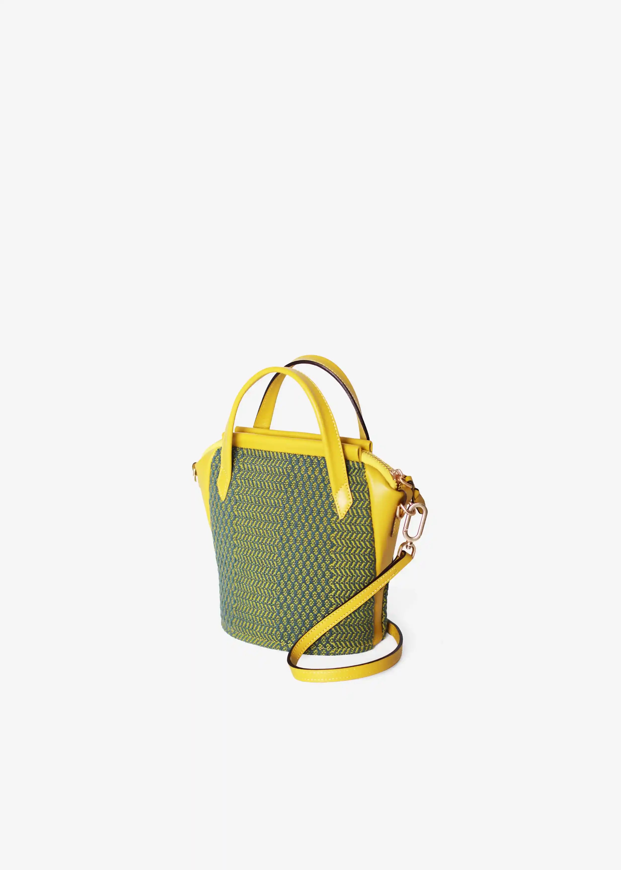 Chicago Mini Dream Green Mango bag perspective view — handwoven cotton with yellow leather double handles and detachable strap