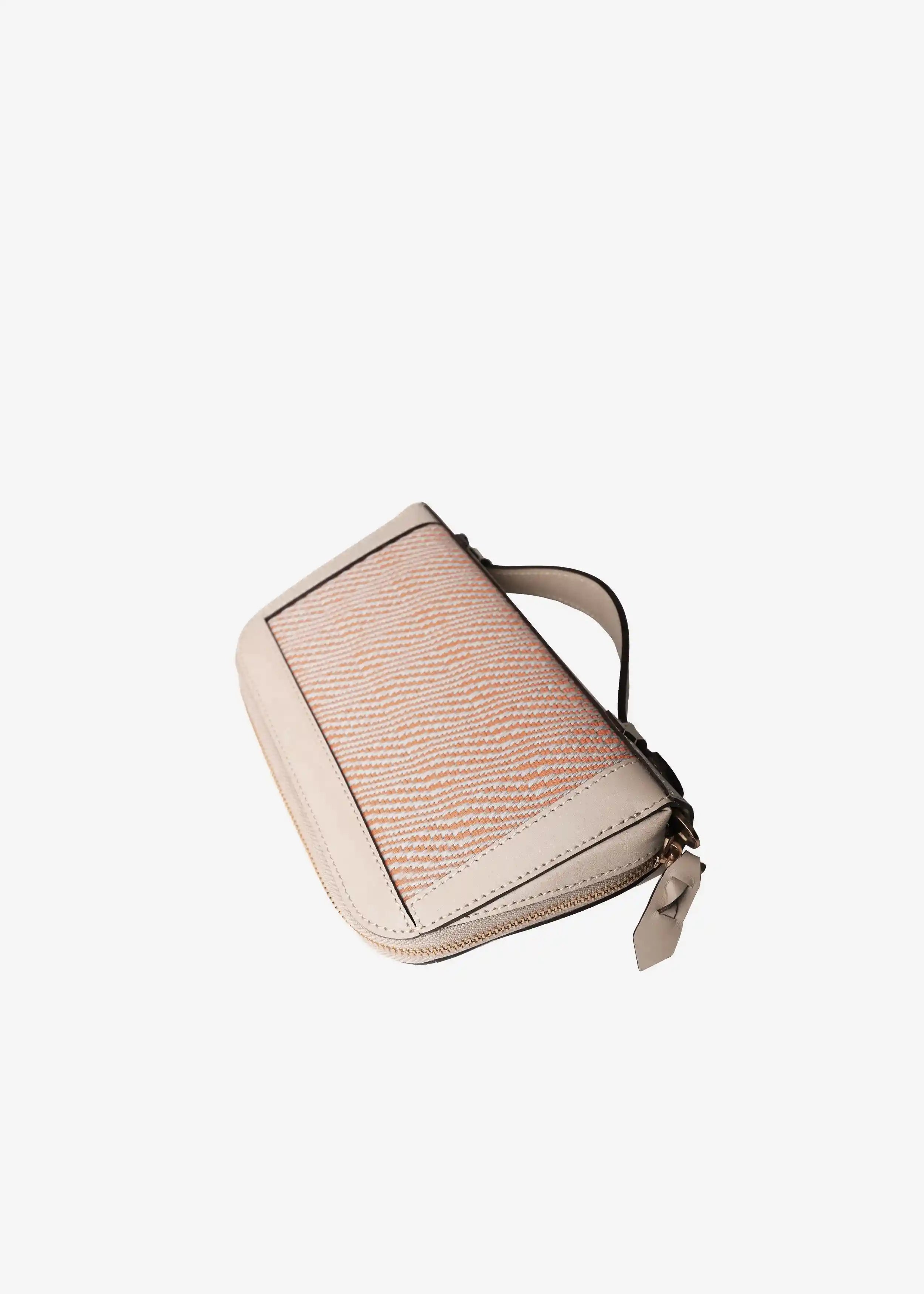 Paris Rise Coral bag top view — handwoven cotton weave with cream nappa leather trim