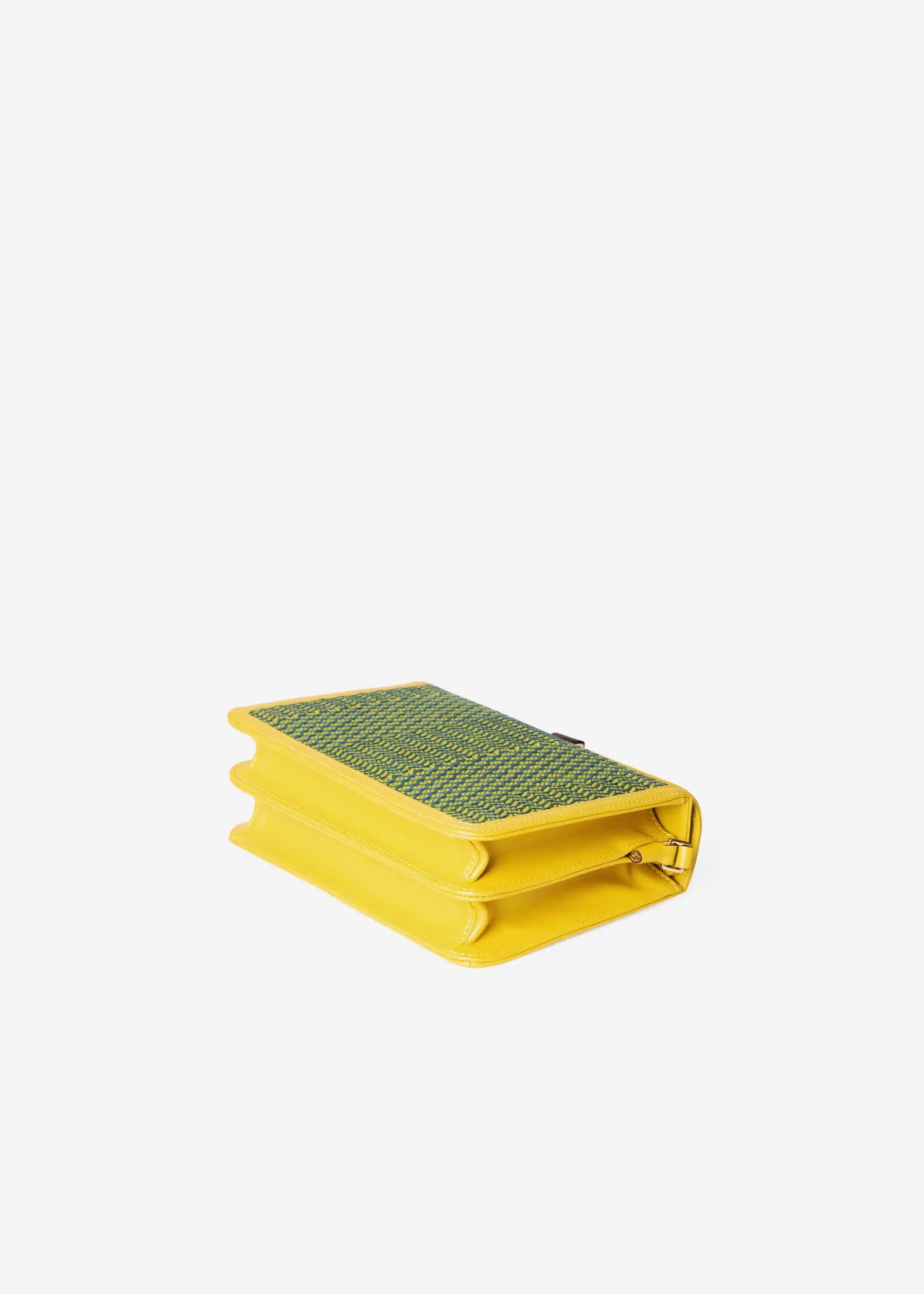 Zürich Dream Green Mango crossbody bag bottom view — structured accordion base with yellow nappa leather