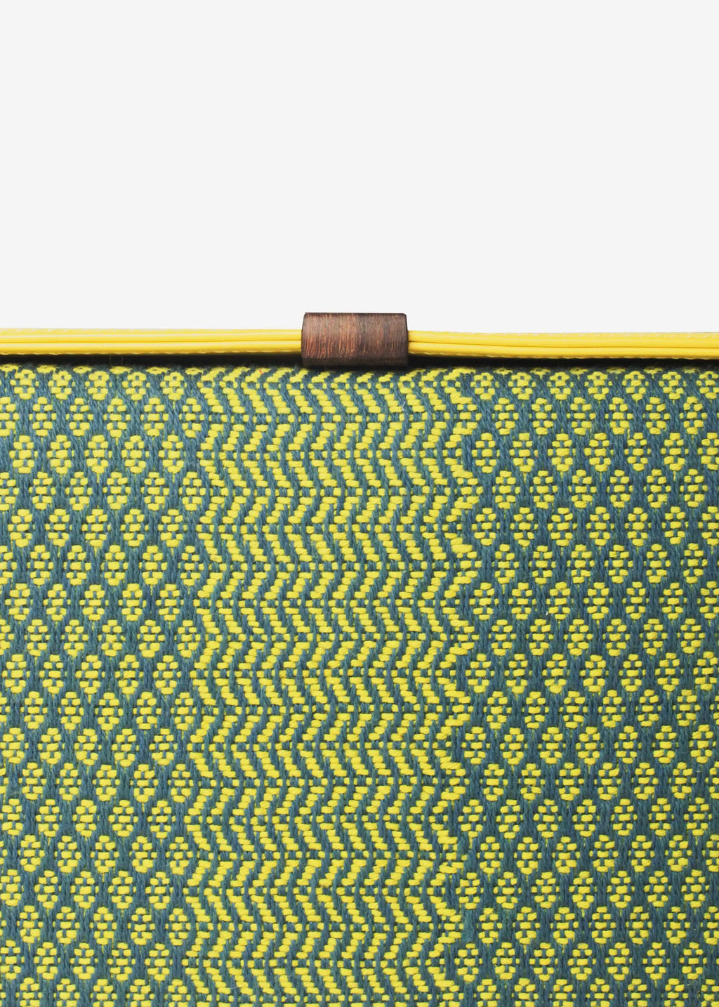 Close-up of Dream Green Mango handwoven cotton weave on Zürich crossbody bag