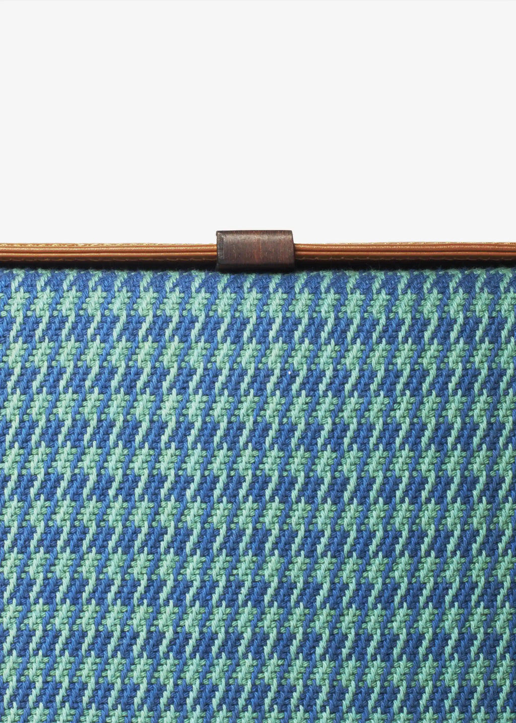 Close-up of Sing Peacock handwoven cotton weave on Zürich crossbody bag