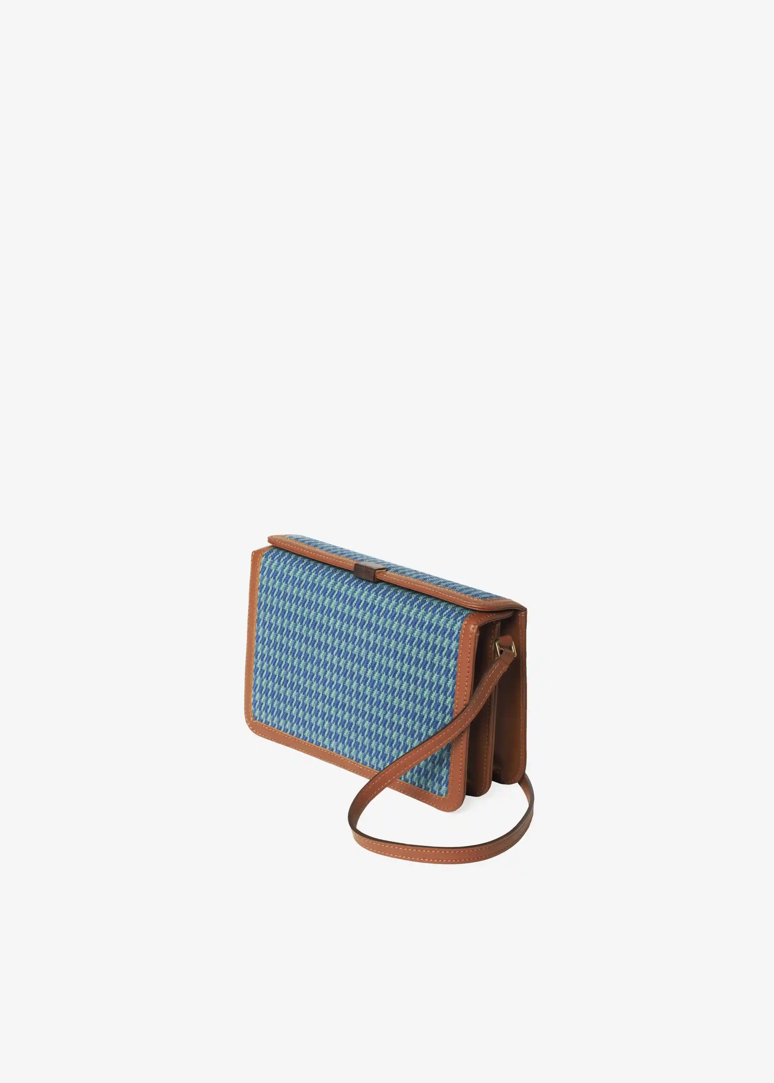 Zürich Sing Peacock crossbody bag angled view — compact structured body with brown nappa leather and rosewood closure