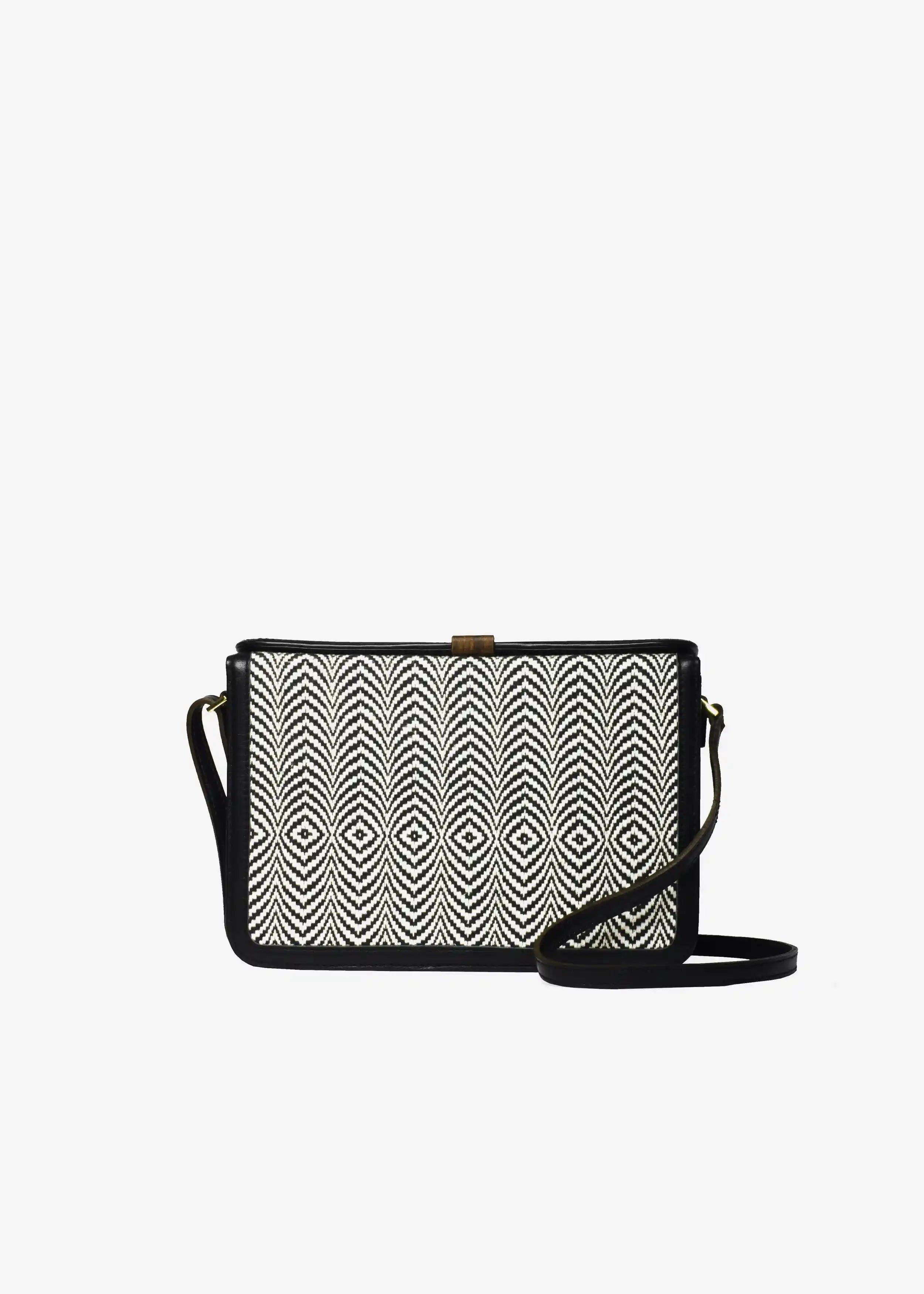Zürich Sizzle Salt & Pepper crossbody bag front — handwoven cotton weave with black nappa leather and reclaimed rosewood tab closure
