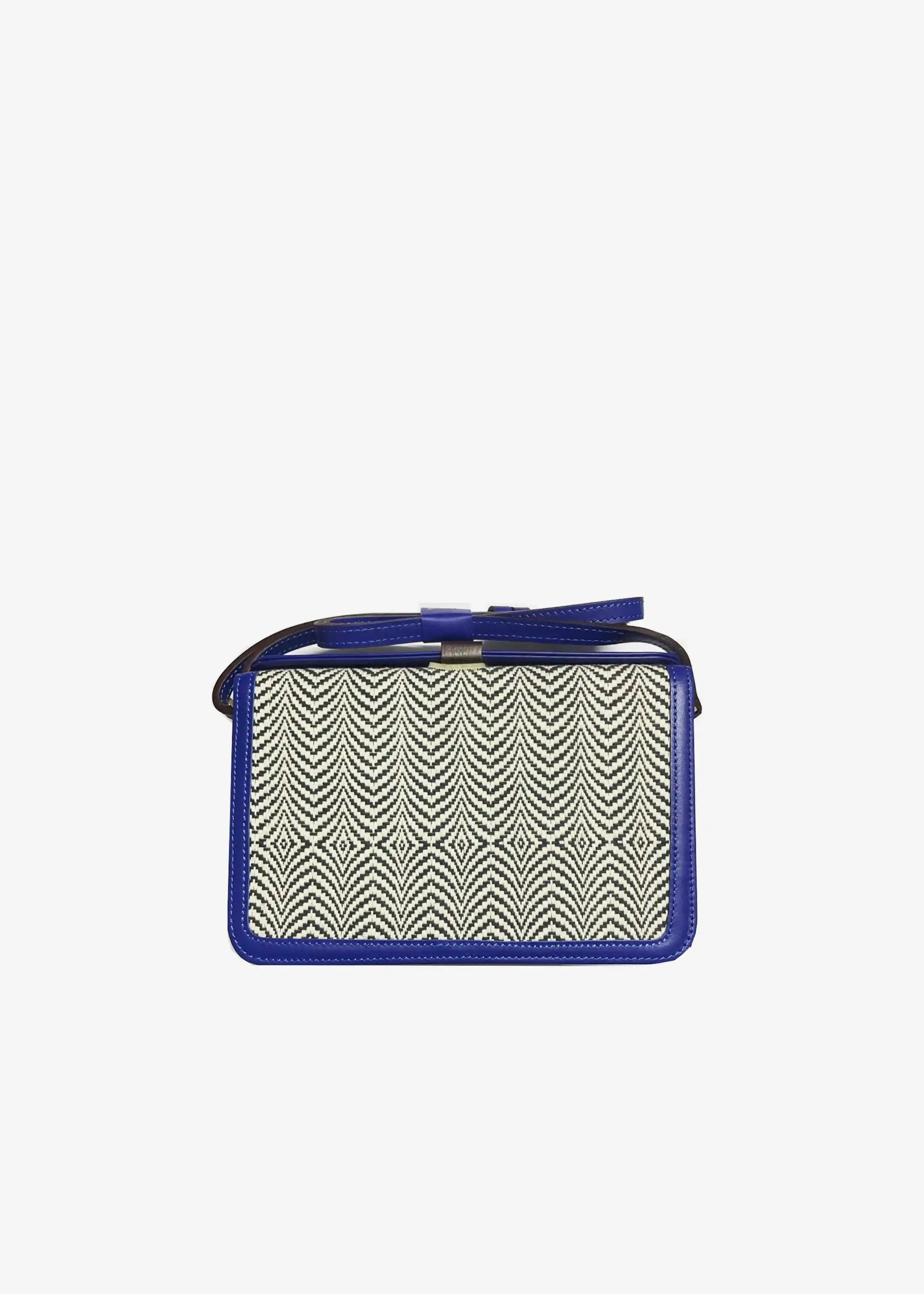 Zürich Sizzle Salt & Pepper crossbody bag front — handwoven cotton weave with blue genuine nappa leather and reclaimed rosewood tab closure
