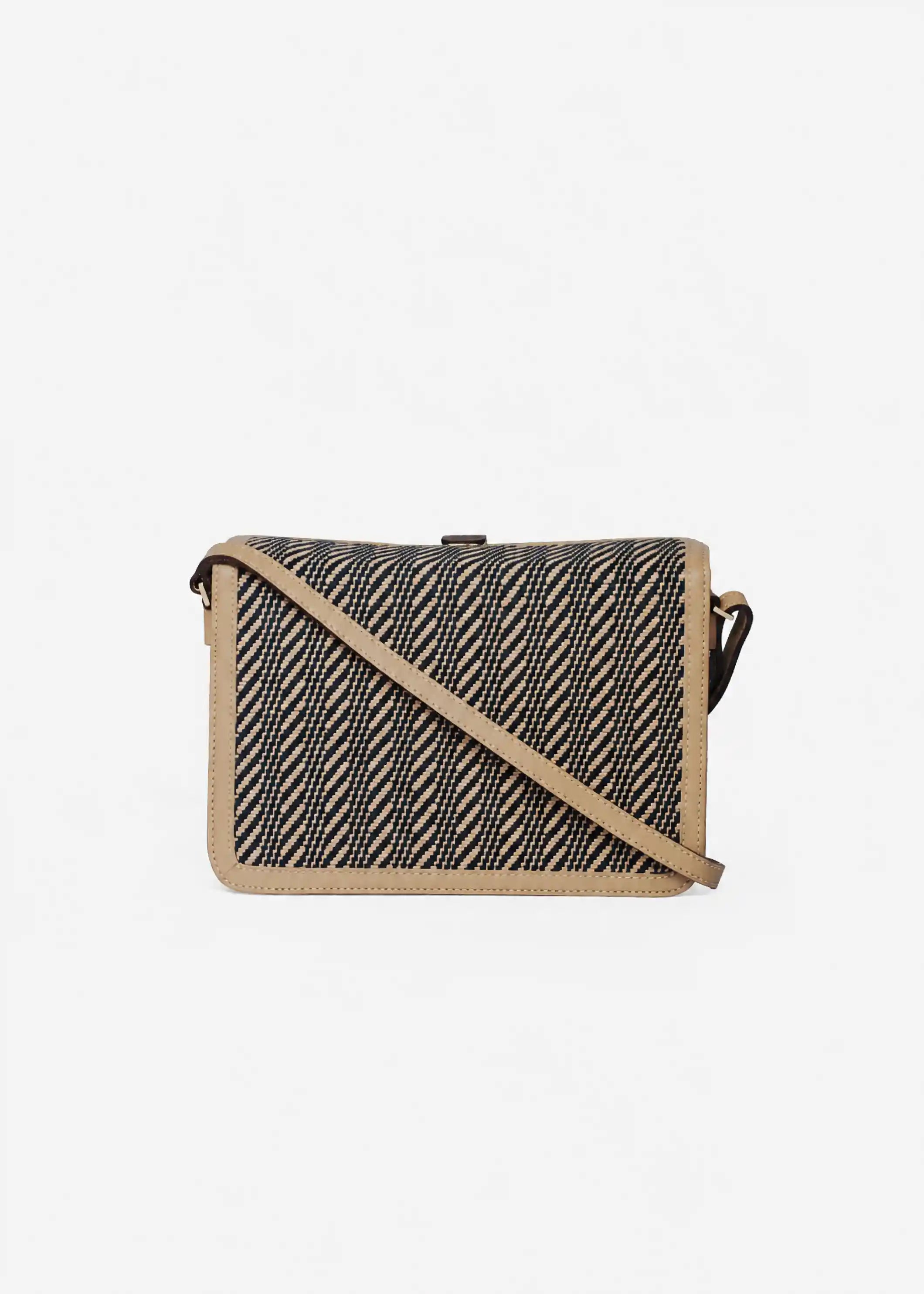 Zürich Twist Dusk crossbody bag angled view — compact structured body with beige nappa leather and rosewood closure